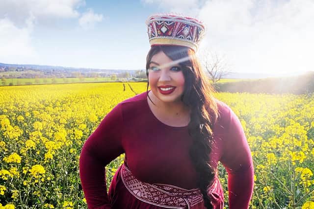 Plus-size Mansfield beauty queen Madara Riley in Latvian costume.