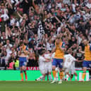 Agony for the Stags as Port Vale fans celebrate Mal Benning's late goal in the 3-0 defeat at Wembley. Picture by Richard Parkes.