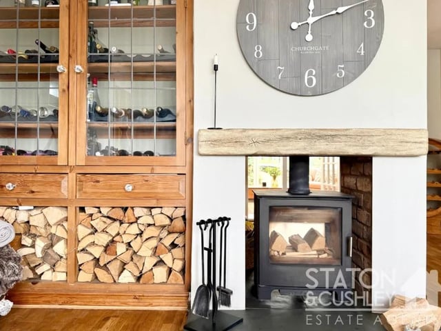 The striking log burner is perfect for cosy family evenings.