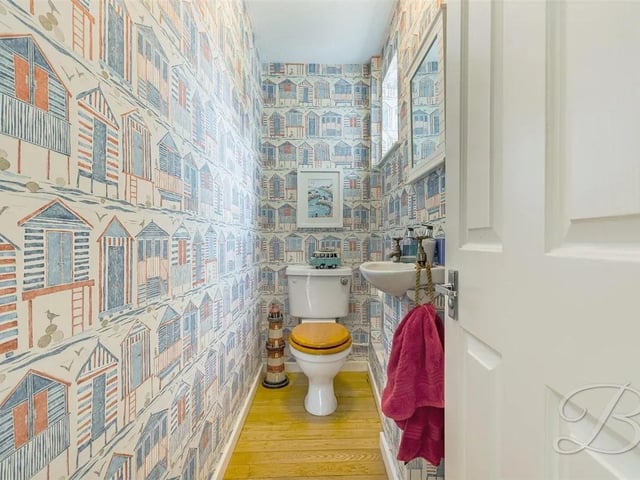 The ground floor boasts a WC for added convenience