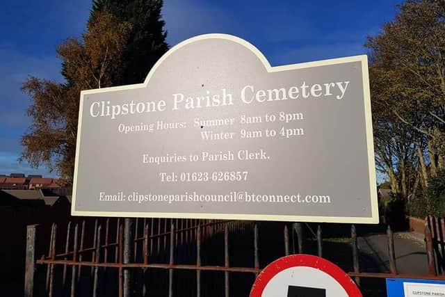 The Clipstone Parish Cemetery sign by the gate where thieves broke in and stole equipment including a ride on mower valued at £8,000 from a container in the carpark.