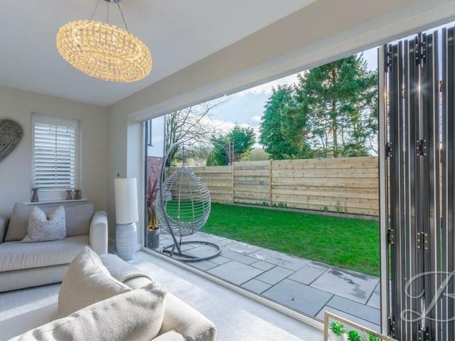 The lounge also allows you to throw open a large set of bi-folding doors on summer days to enjoy the garden.