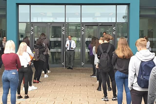 Students queue outside Shirebrook Academy.