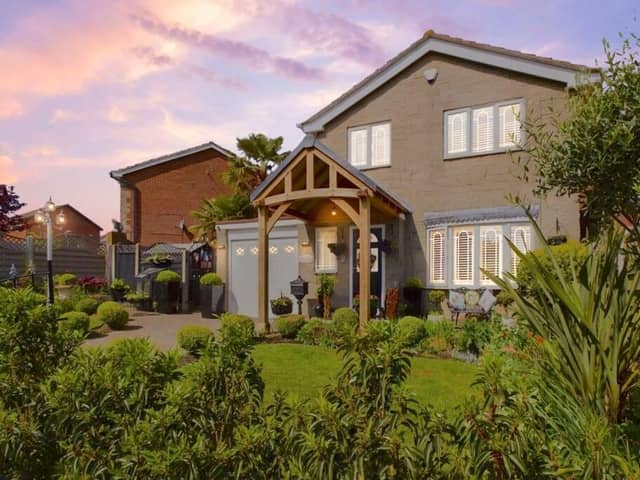 This three-bedroom, detached house on Allendale Way, Forest Town, complete with palm trees, tropical garden and fish pond, has been described as "paradise" by estate agents EweMove (East Midlands), who have attached a price of £270,000.