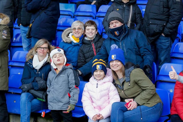 Mansfield Town fans enjoy the win at Stockport County.