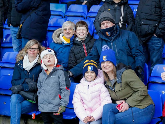 Mansfield Town fans enjoy the win at Stockport County.