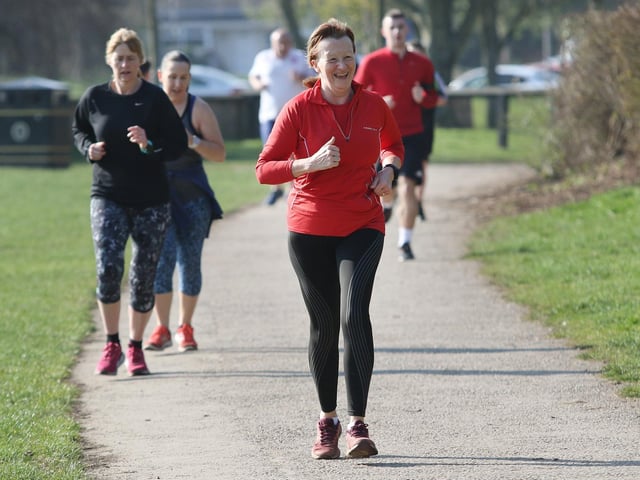 It's all smiles from this runner. The event is free to enter, and you can run, jog, walk, volunteer or spectate.