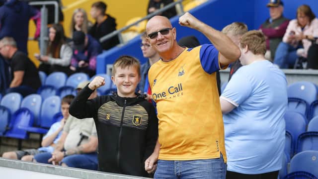 Mansfield Town fans watch the Stag's first home win of the season against Tranmere Rovers.