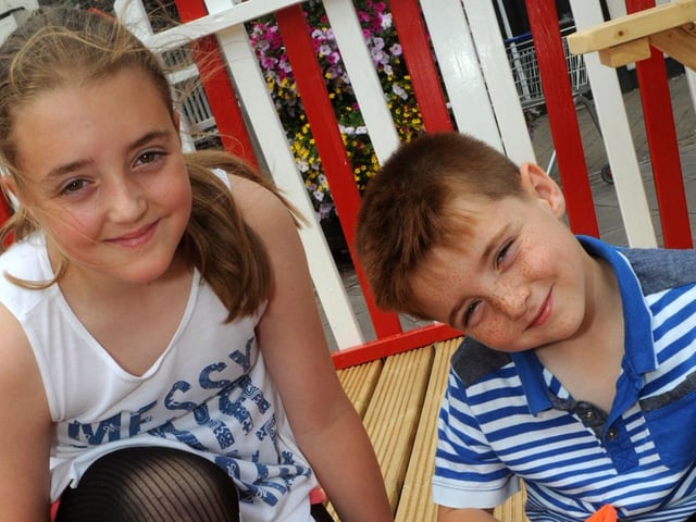 Oscar and Elisha Gentry join forces for a sand castle building job at the Mansfield beach