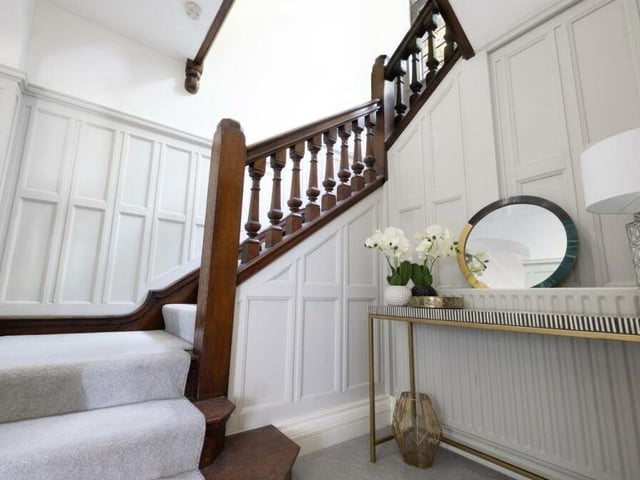 This solid oak winding staircase in the hallway leads the way to the first floor at the £800,000 Mansfield mansion.