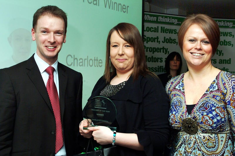 Teacher of the Year award for Charlotte Addison, centre with Specsavers' directors Imogen Hoyle and Patrick Hegarty who sponsored the event.