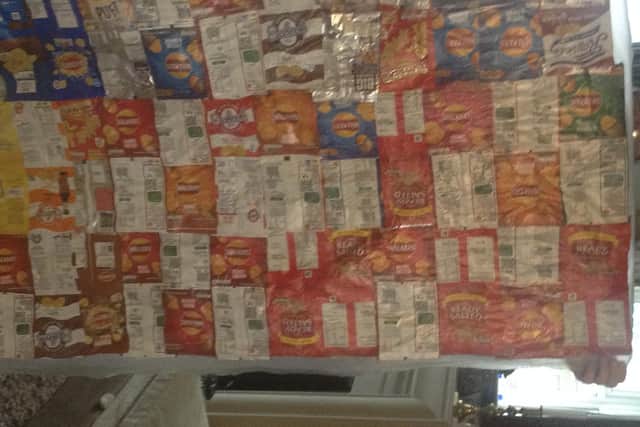 The crisp packets have been ironed together to make a blanket