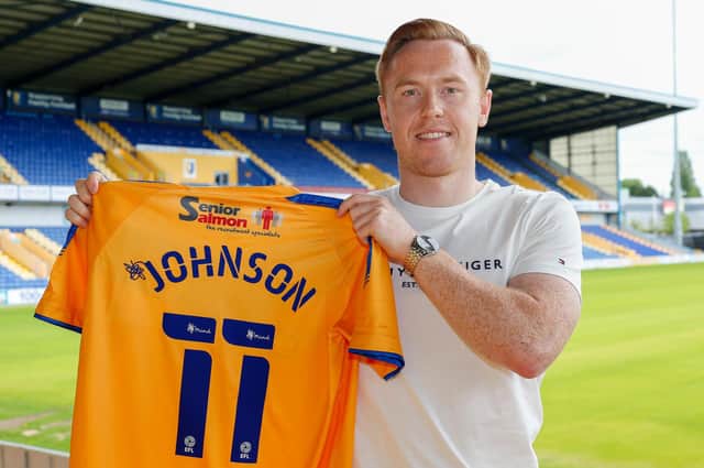 Danny Johnson signs for the  Stags. Photo by Chris Holloway - The Bigger Picture.