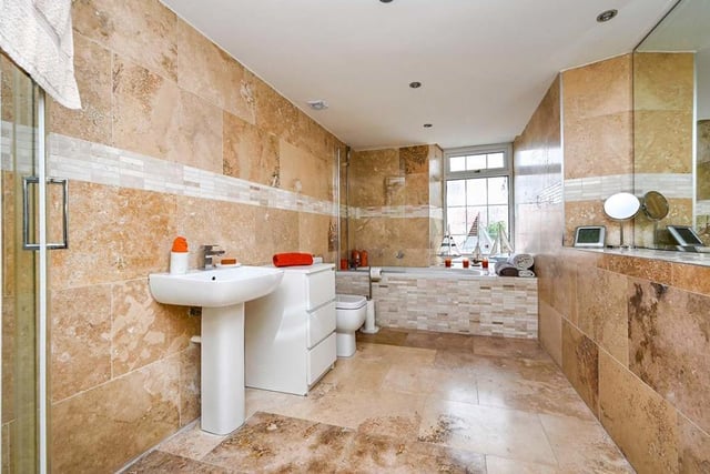 On the first floor you will find this impressive family bathroom. It has a four-piece suite, which comprises a luxury bath with shower over, separate shower, low-flush WC and inset wash hand basin. The floor and walls are fully tiled.