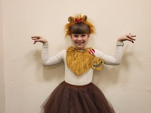 Sofia, age 9, from Mansfield, is dressed as the Cowardly Lion from The Wizard of Oz.