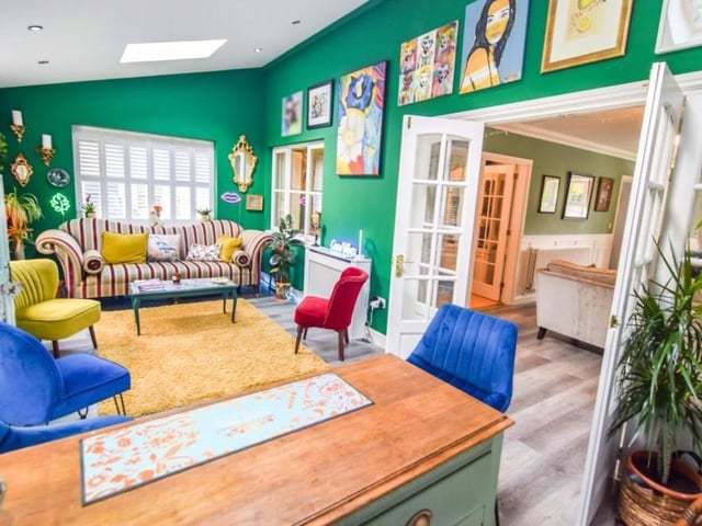 A sumptuous snug or reception room, which is currently being used as a bar area. It is the ideal spot for hosting and entertaining guests.