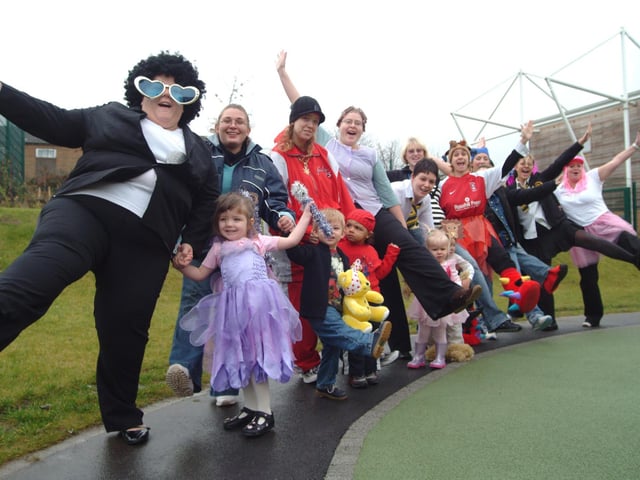 Mansfield's Oaktree Children's Centre held a fancy dress toddle for Pudsey in 2006 as part of their children In Need activity day. Dona Duru, left, Community Involvment Assistant is pictured with staff, parents and youngsters.