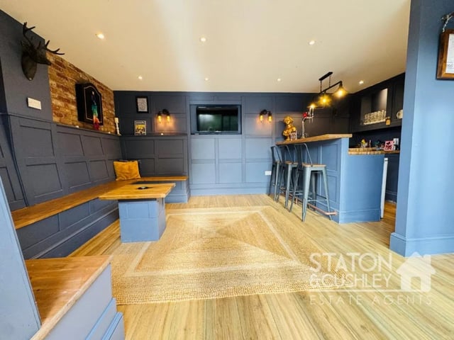 The outdoor bar is ideal for a sociable household which has a fitted bar and pumps as well as seating and its own WC.