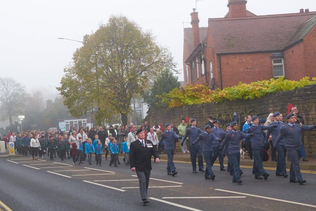 Remembrance parade along the A60.