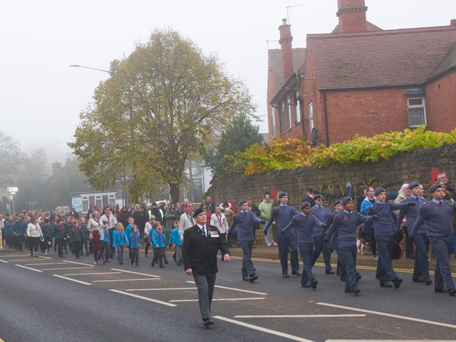 Remembrance parade along the A60.