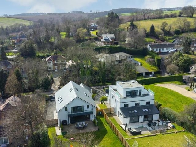 This aerial view shows how the £1.25 million property stands proud on Lambley Lane in the popular village.