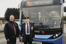 Trentbarton driver Eric Clarke (left) with Brian Brown from the Royal British Legion.