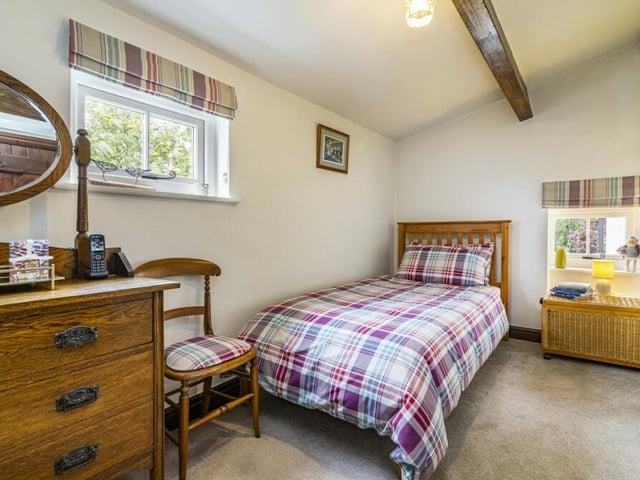 Like the master, the second bedroom at the £350,000 cottage is a well-proportioned, expertly presented space, with lots of natural light.