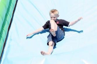 2006: This young man is having fun on the big slide at the Eastwood Family Fun Day.