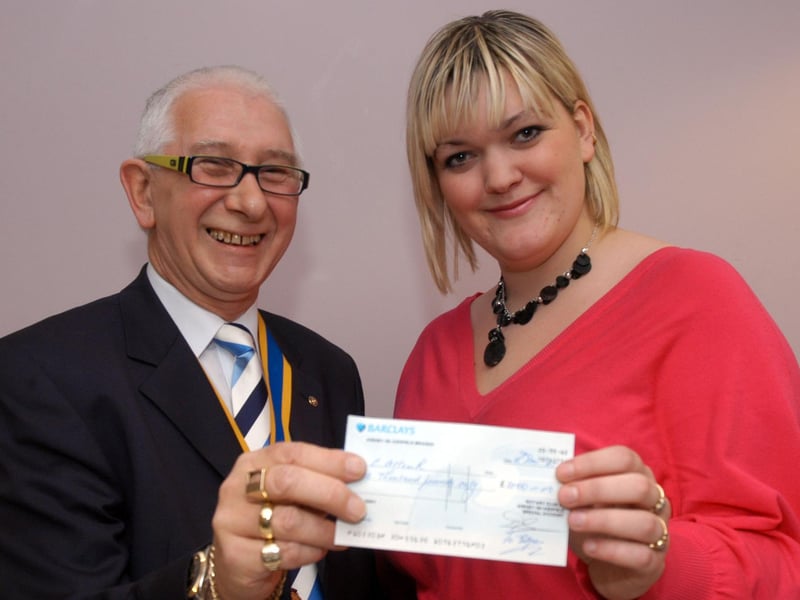 Chad's Charlotte Allcock collects her £1000 prize money from Bill Wilson, President of Kirkby In Ashfield Rotary Club. Year: 2007.