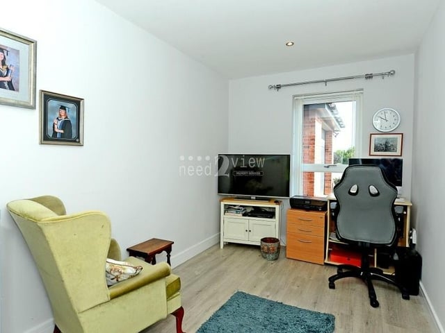 The smallest if the four bedrooms is so versatile that it could be converted into a functional home office or study. The window overlooks the rear garden.