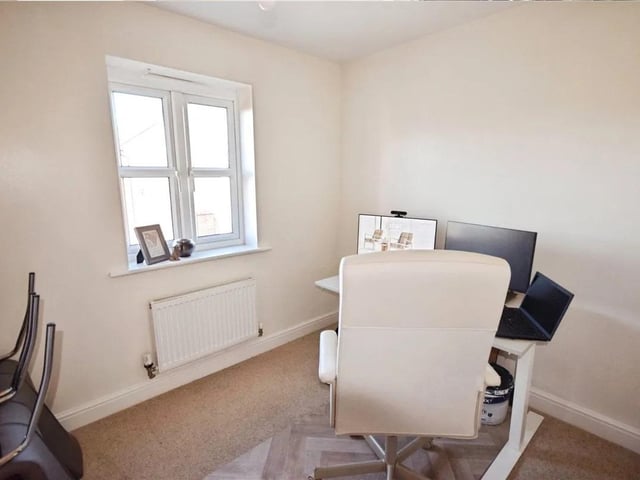 One of the bedrooms is currently used as a home office.