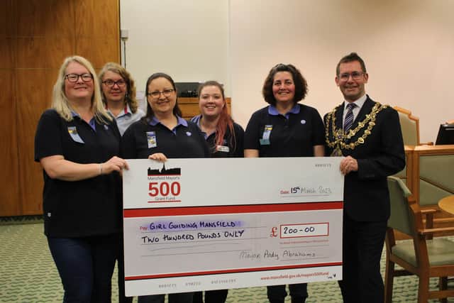A cheque was presented to Girl Guiding Mansfield.