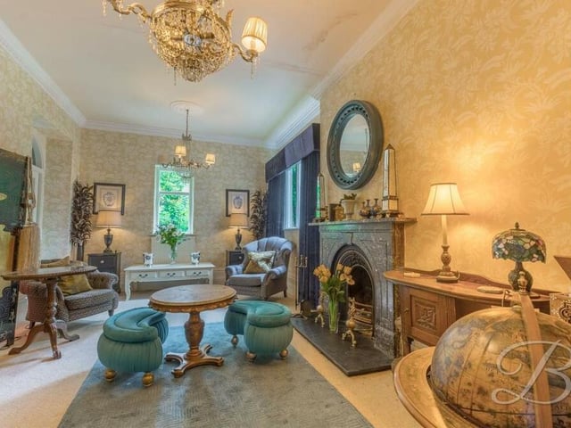 Another splendid asset to the ground floor is this garden room. It has a feature fireplace and windows to the side and rear of the property. Next door to the garden room sits a conservatory.