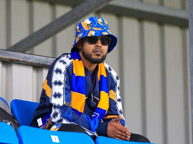 Mansfield Town were beaten after letting a 2-0 half-time lead slip away.