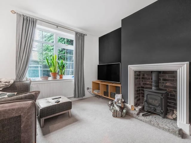 This cosy space is perfect for relaxing with loved ones or entertaining guests.