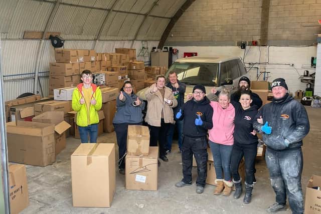 A team of volunteers helped pack the donations
