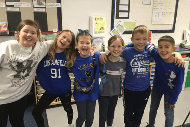 Brave Penny Elland (3rd from left), with fellow pupils wearing blue for World Diabetes Day