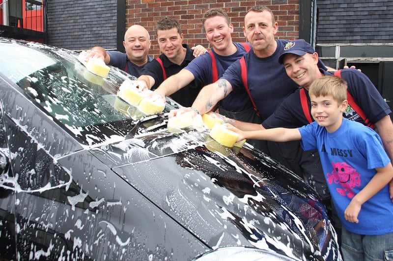 Eastwood fire station charity car wash. l-r firefighters Dave Caress, Paul Oldnall, Tom Ball, crew manager Paul Bradley, firefighter Brian Kinton and volunteer Finn Syson in 2009.