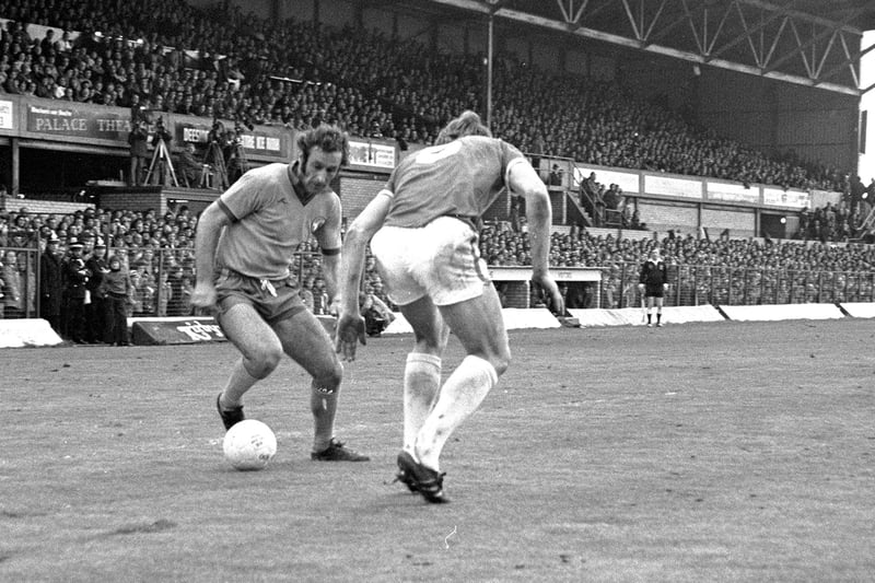 Kevin Randall looks to beat his man at Wrexham in 1977. A 1-0 win saw Mansfield lift the Division Three title.