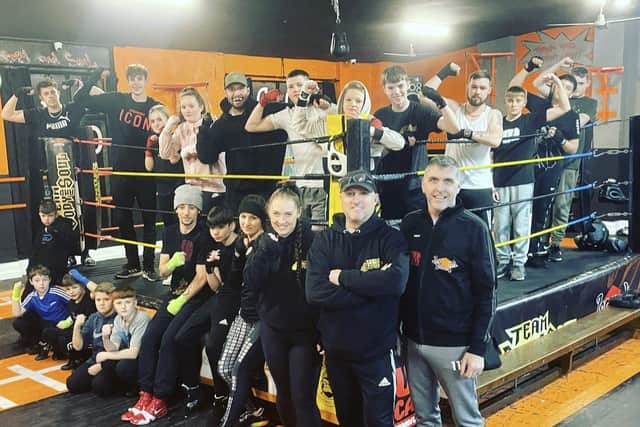Roger Brotherhood with some of the coaches and gym users at his venue in the Handley Arcade, Leeming Street, Mansfield.