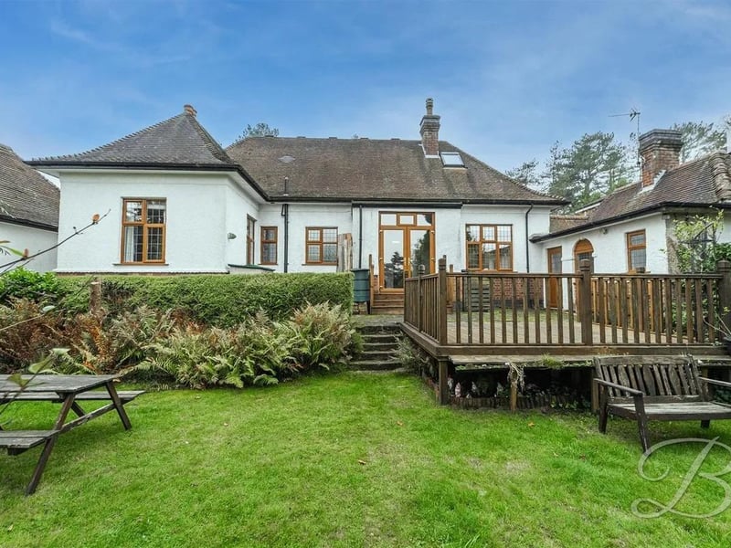 A spacious decked seating area provides the perfect spot for outdoor entertaining, ideal for BBQs and gatherings with family and friends.