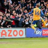 Mansfield Town midfielder Stephen Quinn celebrates his second half goal last weekend.