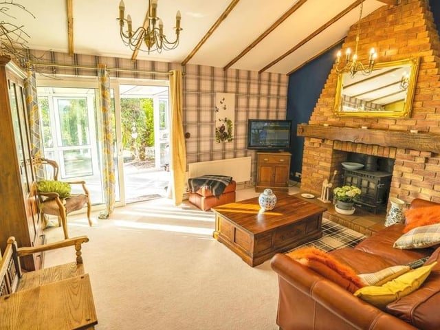 A third and final shot of the lounge, which shows how comfortable a space it is. The floor is carpeted, and sliding doors lead to our next port of call, the conservatory.