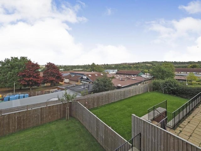 The last photo in our gallery shows the panoramic views of Mansfield's countryside from a bedroom at the back of the house.