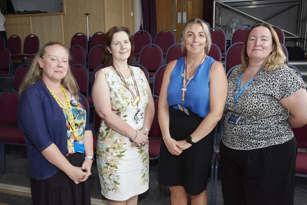 Corinne Kitchen, deputy People Wellbeing Lead, Claire Ward, chair of the Board of Directors, Kim Kirk, operations lead for Hospital COVID Vaccination Hub and Donna Mariner, associate director of People (Resourcing).