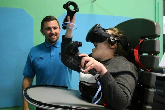 Portland College physiotherapy manager Alistair Beverley, left, is helping to train 120,000 students around the world to work with people with intellectual disabilities.