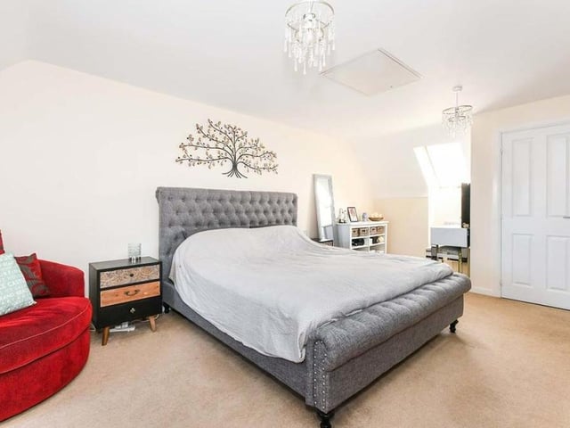 Moving up to the first floor now, and the main bedroom is a good-sized double, with a built-in, double wardrobe. It overlooks the back of the property and has access to an en suite shower room, which has a shower cubicle, low-flush WC and wash hand basin.