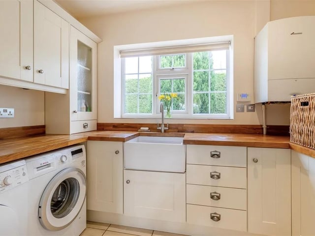 The home benefits from a separate utility room