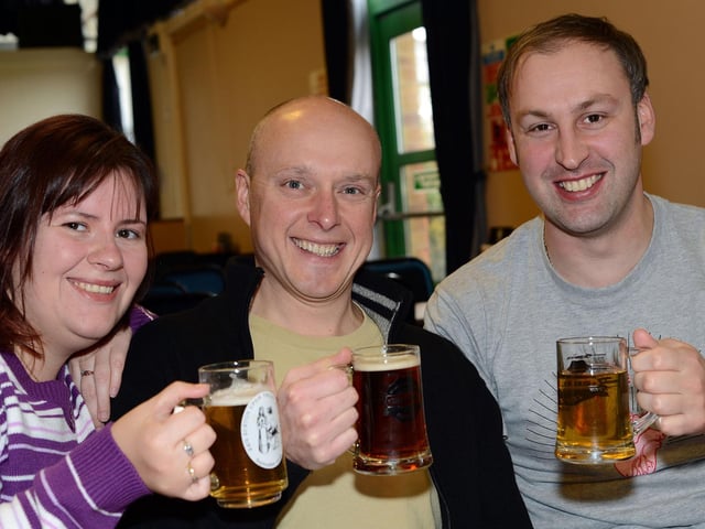 South Normanton beer festival in 2013. Danielle Stocks, Chris Vincent and Paul Fowler with their selection of beers.