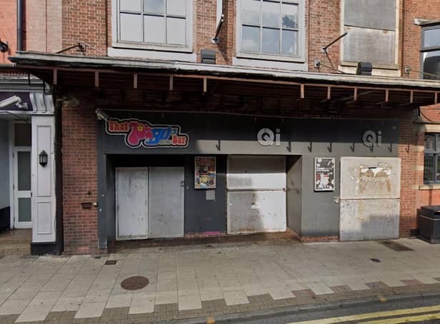 The old entrance to QI, next to The Widow Frost on Leeming Street.
